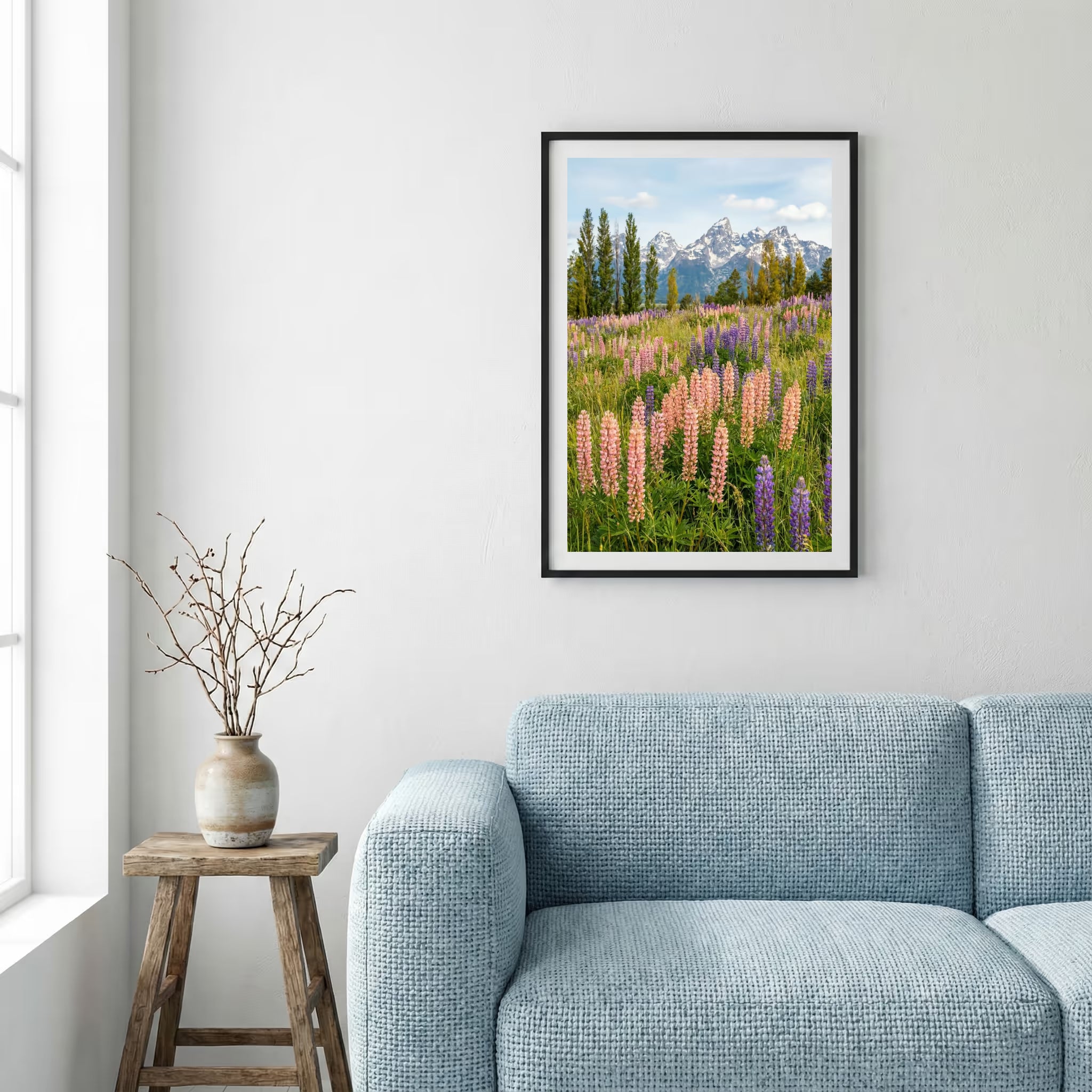 Jagged rocky peak rising above a green grassy ridge trail under a blue sky — framed canvas wall art in a wooden frame, 16×24 in