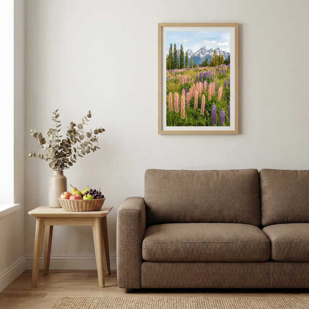 Jagged rocky peak rising above a green grassy ridge trail under a blue sky — wooden-frame wall art print, 20×30 in