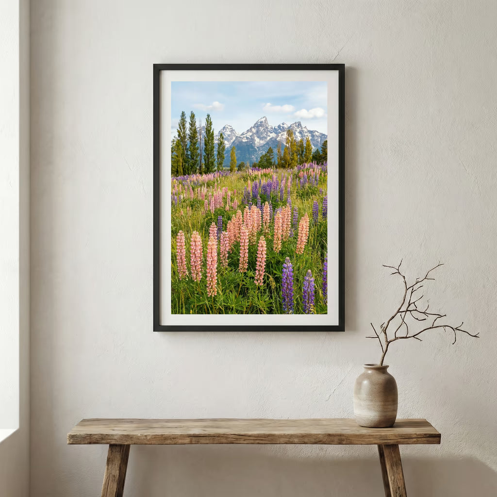 Jagged rocky peak rising above a green grassy ridge trail under a blue sky — wooden frame canvas wall art print, 12×18 in
