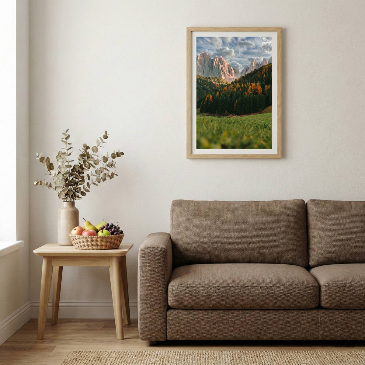 Jagged alpine peaks rising above a green valley dotted with autumn-colored trees — wooden-frame wall art print, 20×30 in