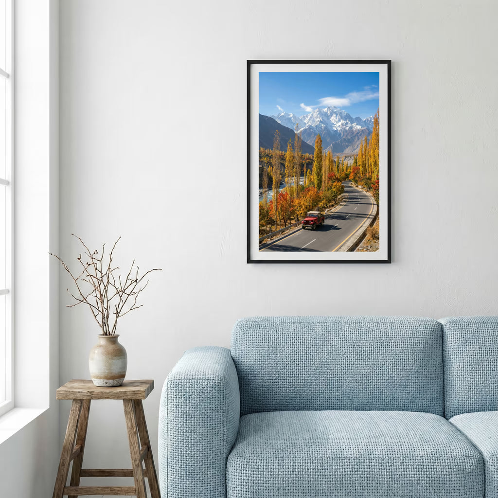 Blossoming trees lining a hillside path under a bright, cloud-filled blue sky — framed canvas wall art in a wooden frame, 16×24 in
