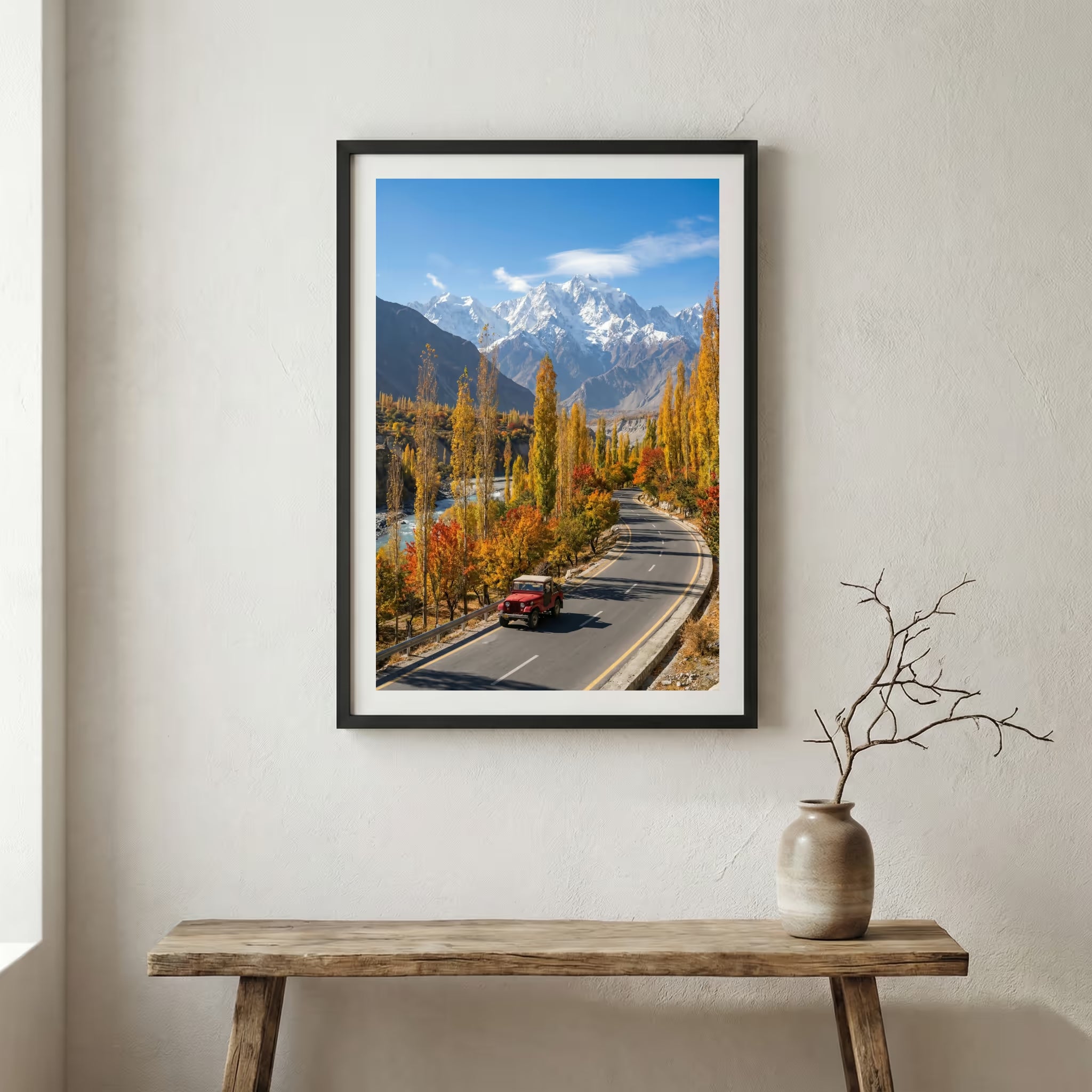 Blossoming trees lining a hillside path under a bright, cloud-filled blue sky — wooden frame canvas wall art print, 12×18 in
