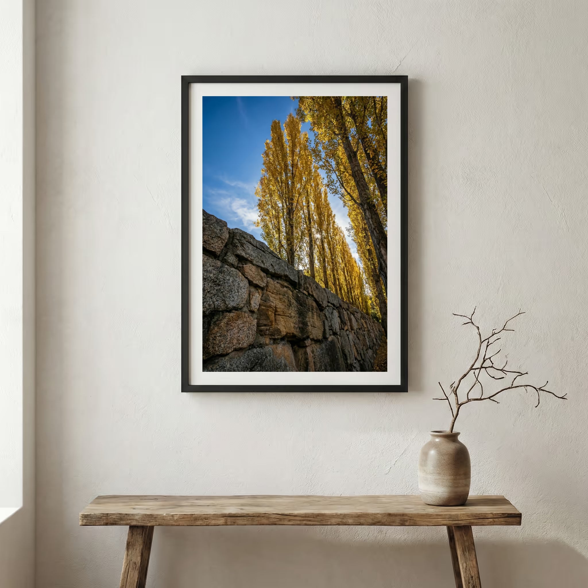 Pink blossom trees in a green meadow beneath snow-capped mountain peaks — wooden frame canvas wall art print, 12×18 in