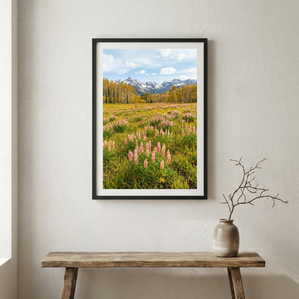 Aerial view of a valley in full bloom with pink blossom trees and a mountain backdrop — wooden frame canvas wall art print, 12×18 in