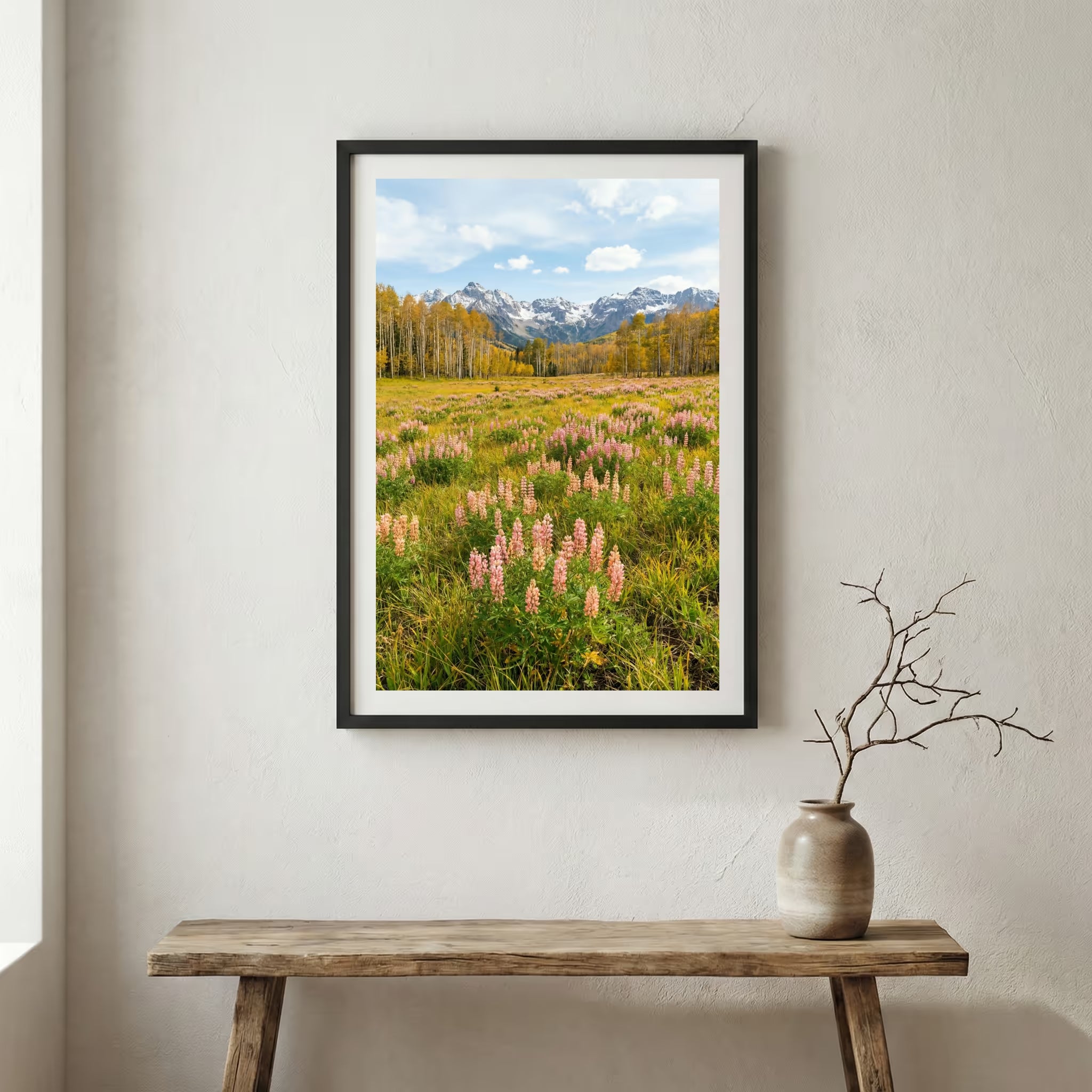 Aerial view of a valley in full bloom with pink blossom trees and a mountain backdrop — wooden frame canvas wall art print, 12×18 in