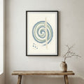 Blue Green Spiral Abstract canvas wall art in a framed room setting