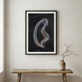 Black Silver Swoosh Abstract canvas wall art in a framed room setting