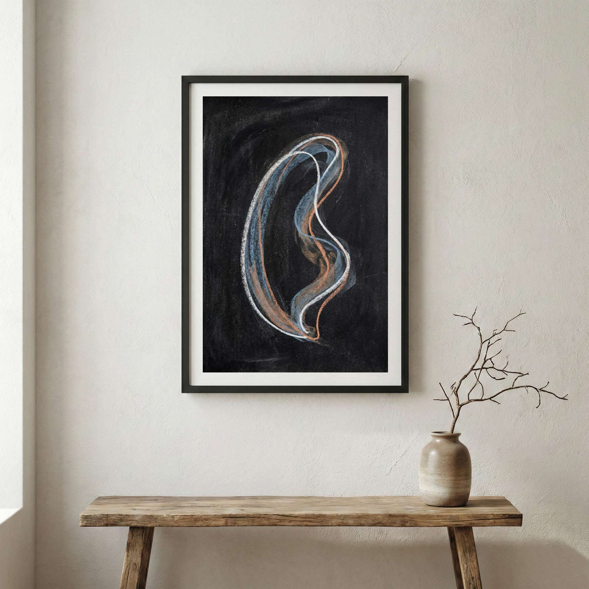 Black Silver Swoosh Abstract canvas wall art in a framed room setting