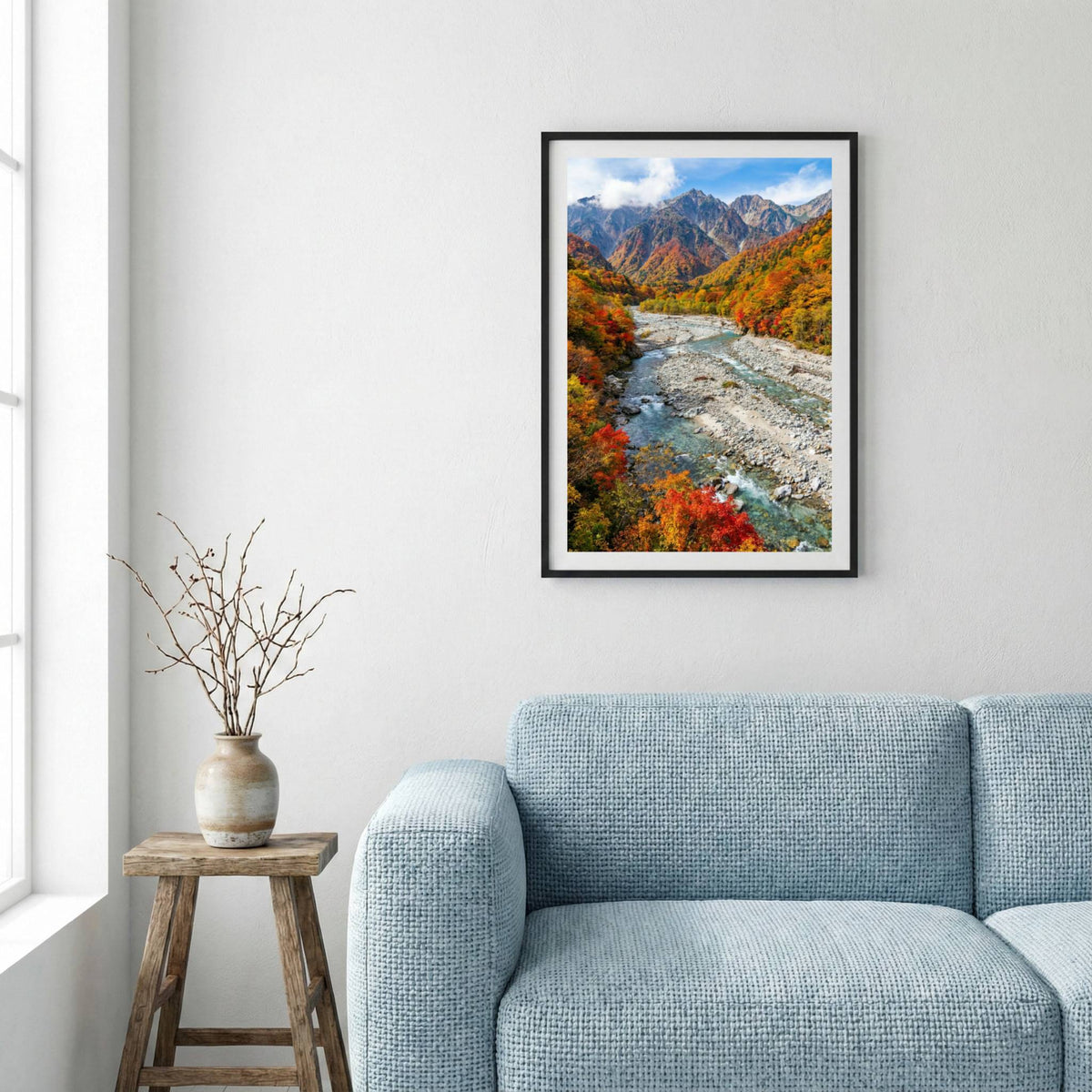Vivid red and orange autumn foliage lining a turquoise mountain river — framed canvas wall art in a wooden frame, 16×24 in