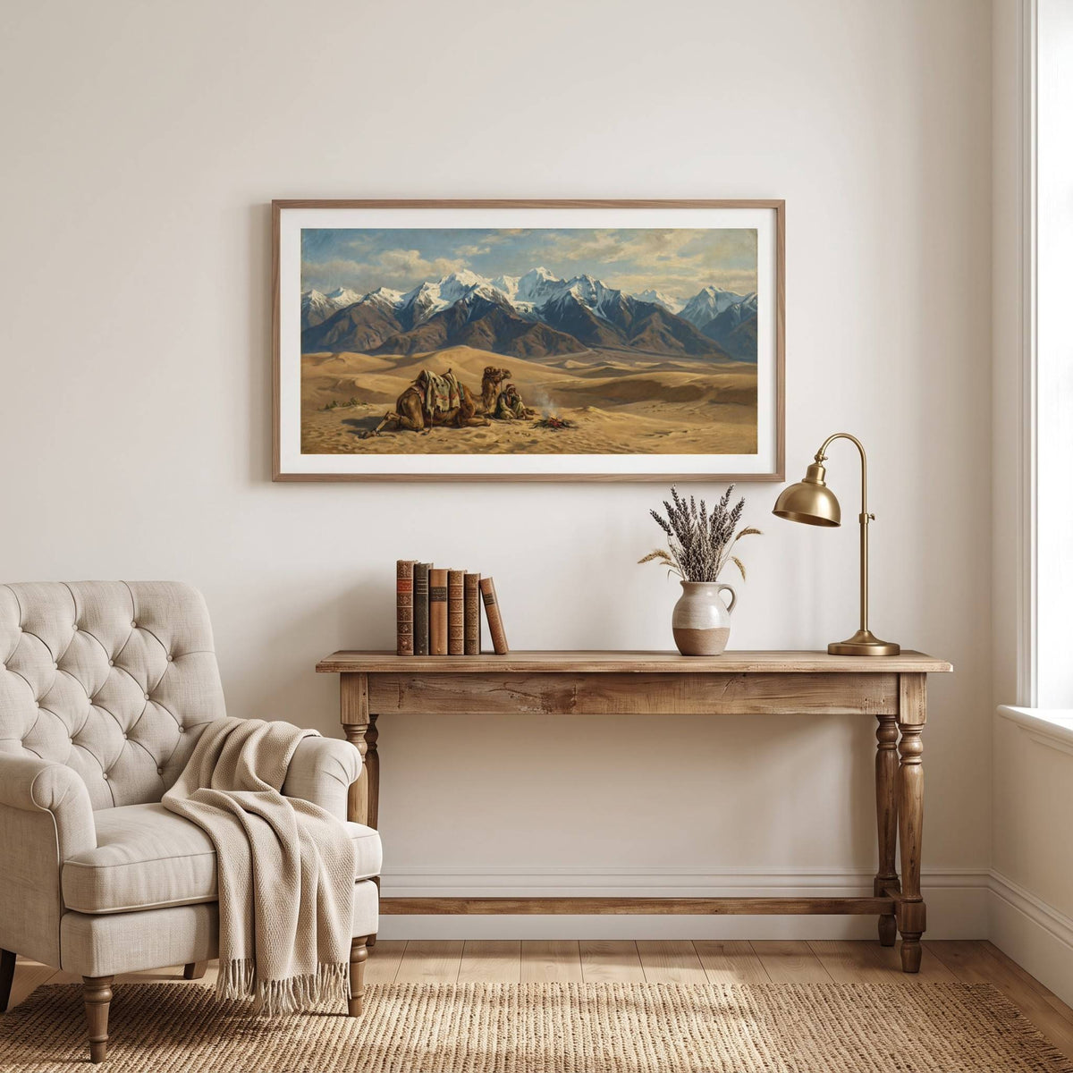 Vintage painting of resting camels in the desert with snow-capped mountains beyond — framed vintage painting.