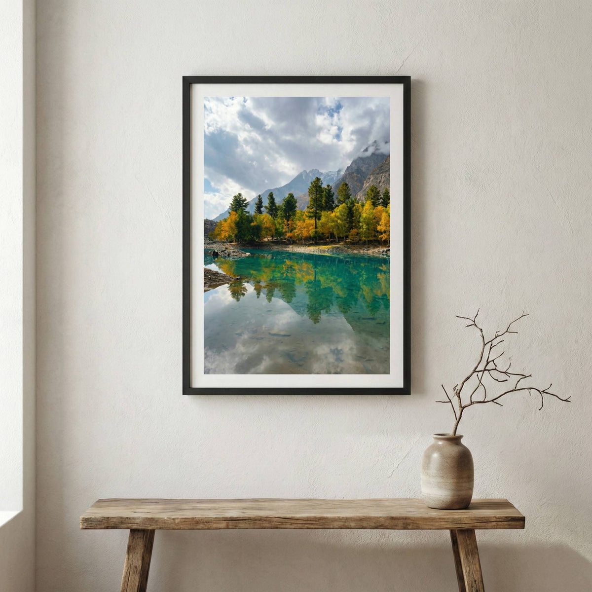 Emerald-toned alpine lake reflecting mountains and golden autumn trees — wooden frame canvas wall art print, 12×18 in
