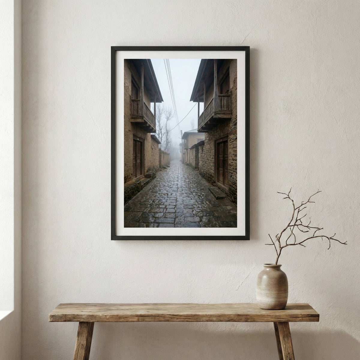 Misty cobblestone alley lined with traditional wooden-balcony buildings — wooden frame canvas wall art print, 12×18 in