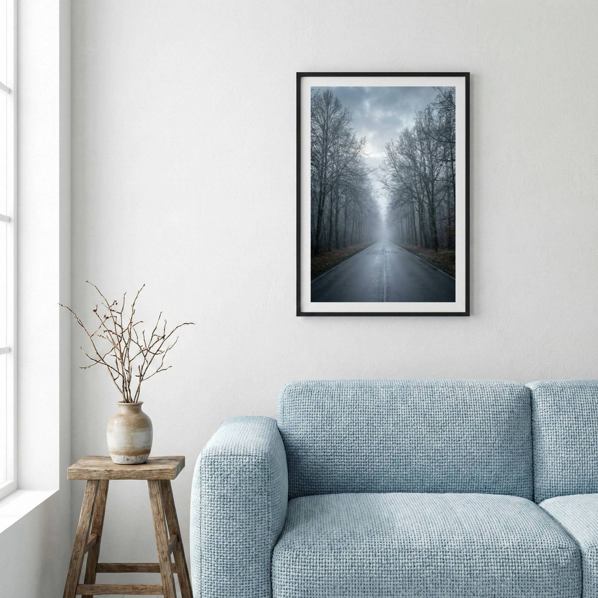 Row of bare, leafless trees lining a road in thick fog — framed canvas wall art in a wooden frame, 16×24 in