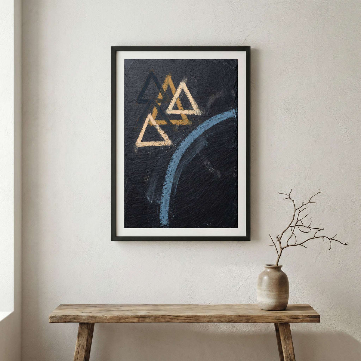 Navy Gold Triangle Abstract canvas wall art in a framed room setting