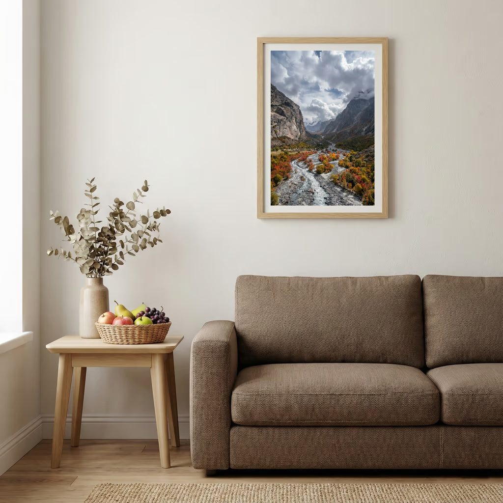 Golden autumn valley with evergreen trees and a snow-capped peak in the distance — wooden-frame wall art print, 20×30 in