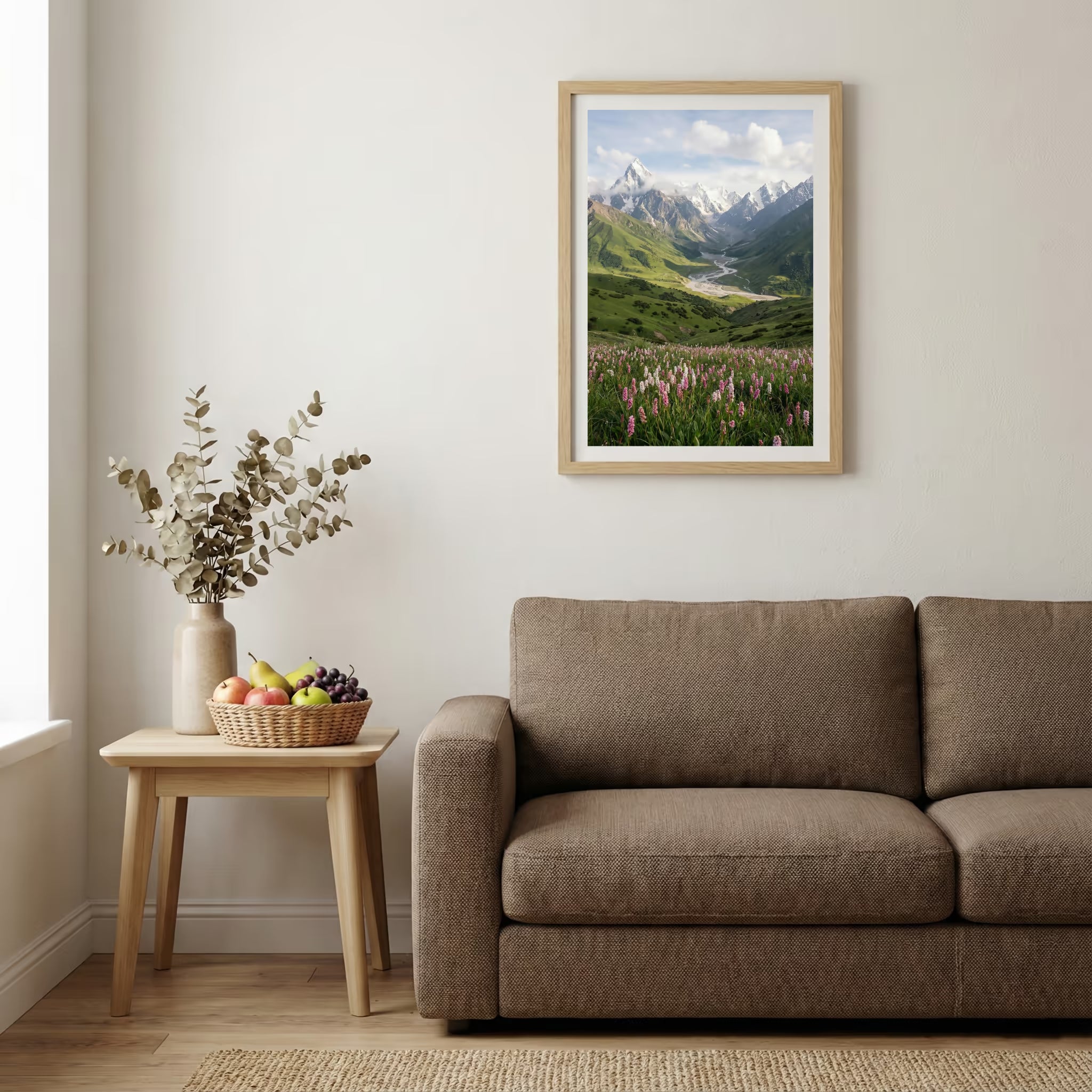 Aerial view of golden badlands terrain with a winding stream and patches of snow — wooden-frame wall art print, 20×30 in
