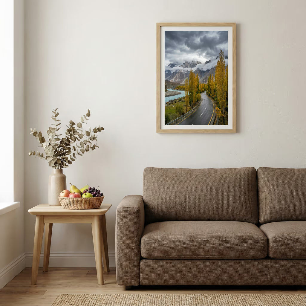 Dramatic sunset over snow-capped peaks above a red-gold valley and turquoise river — wooden-frame wall art print, 20×30 in