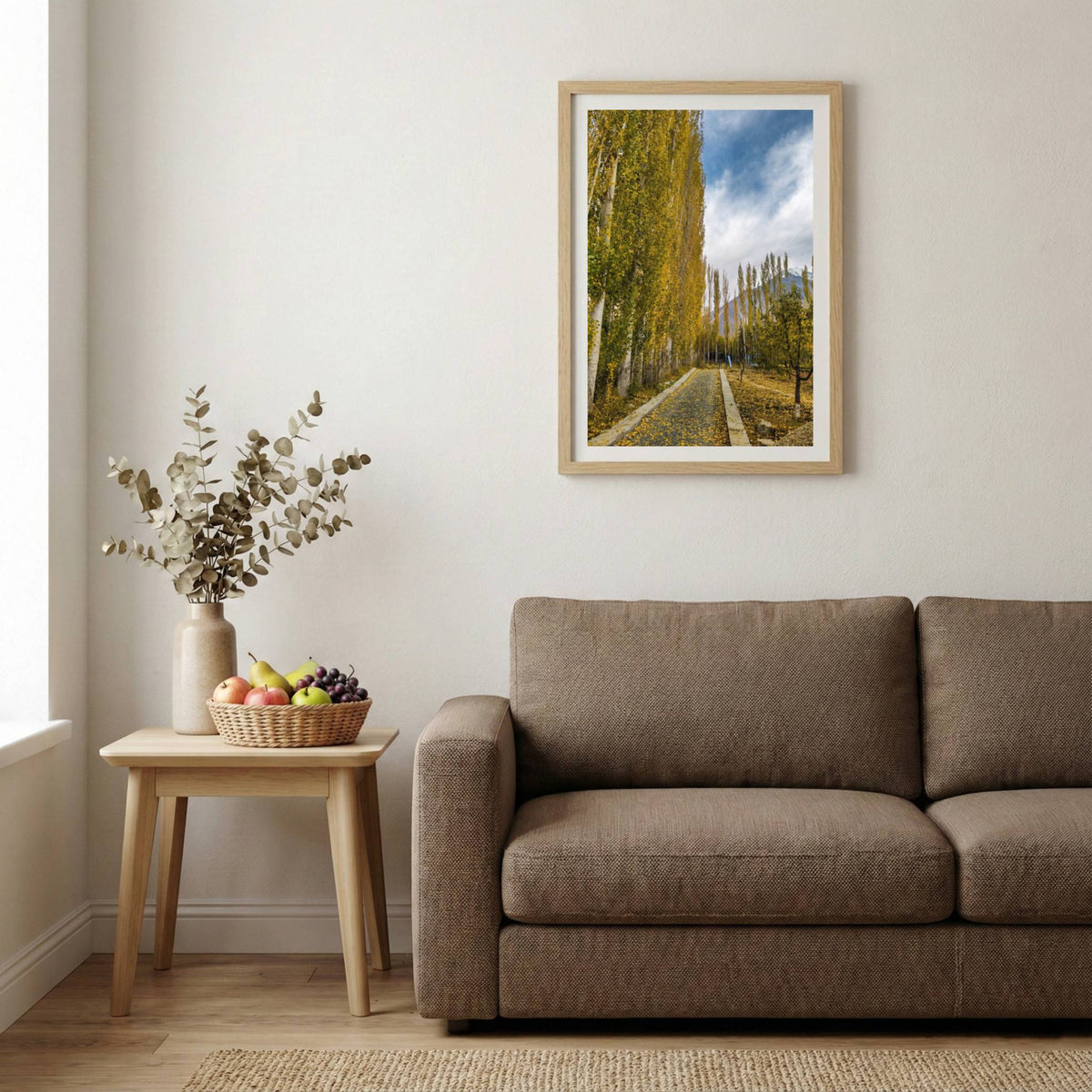 Stone-walled walkway lined with golden poplar trees leading toward the mountains — wooden-frame wall art print, 20×30 in