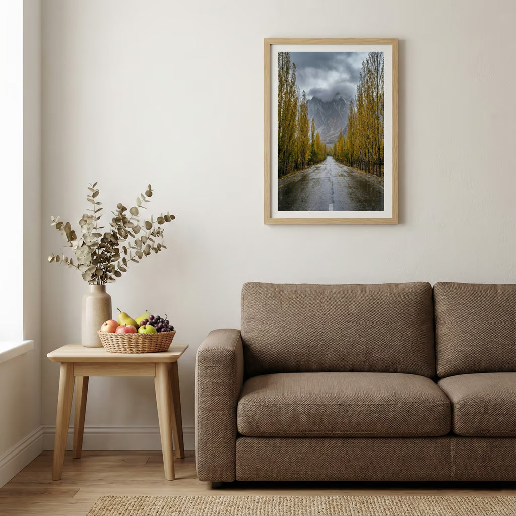 Stone-walled walkway lined with golden poplar trees leading toward the mountains — wooden-frame wall art print, 20×30 in