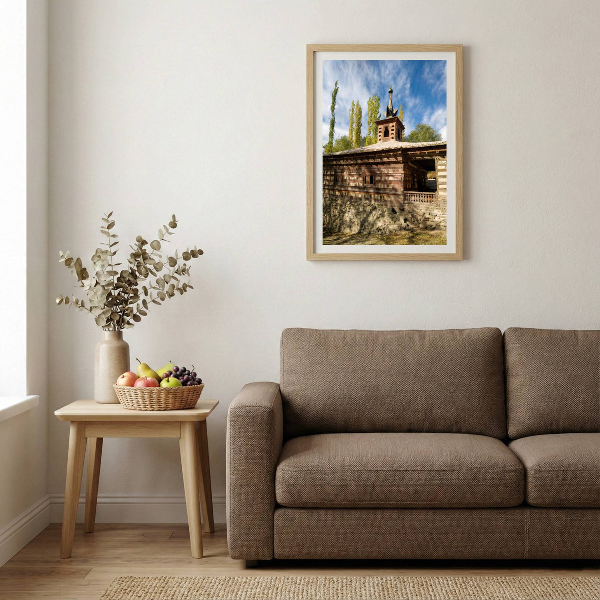 Historic wooden building with an ornate spired tower amid golden poplar trees — wooden-frame wall art print, 20×30 in
