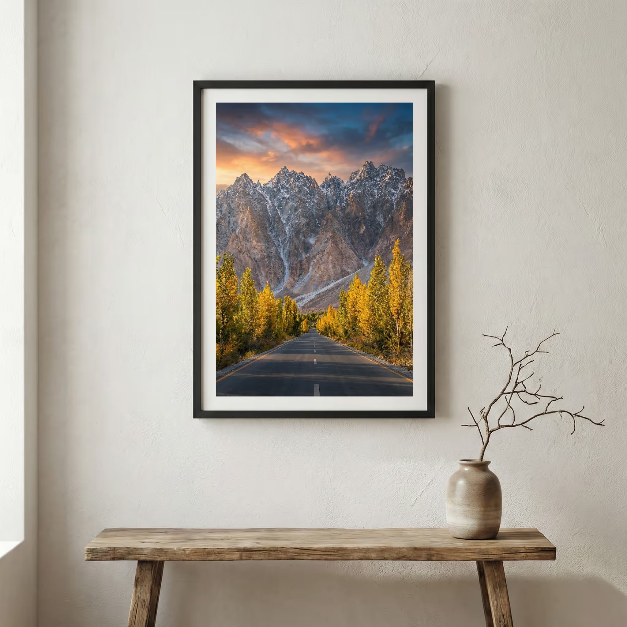 Historic wooden building with an ornate spired tower amid golden poplar trees — wooden frame canvas wall art print, 12×18 in