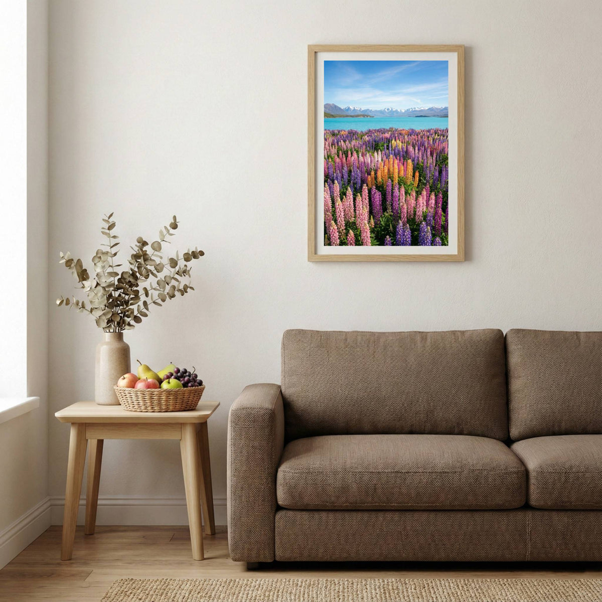Purple lupine flowers blooming along a turquoise lakeshore beneath the mountains — wooden-frame wall art print, 20×30 in