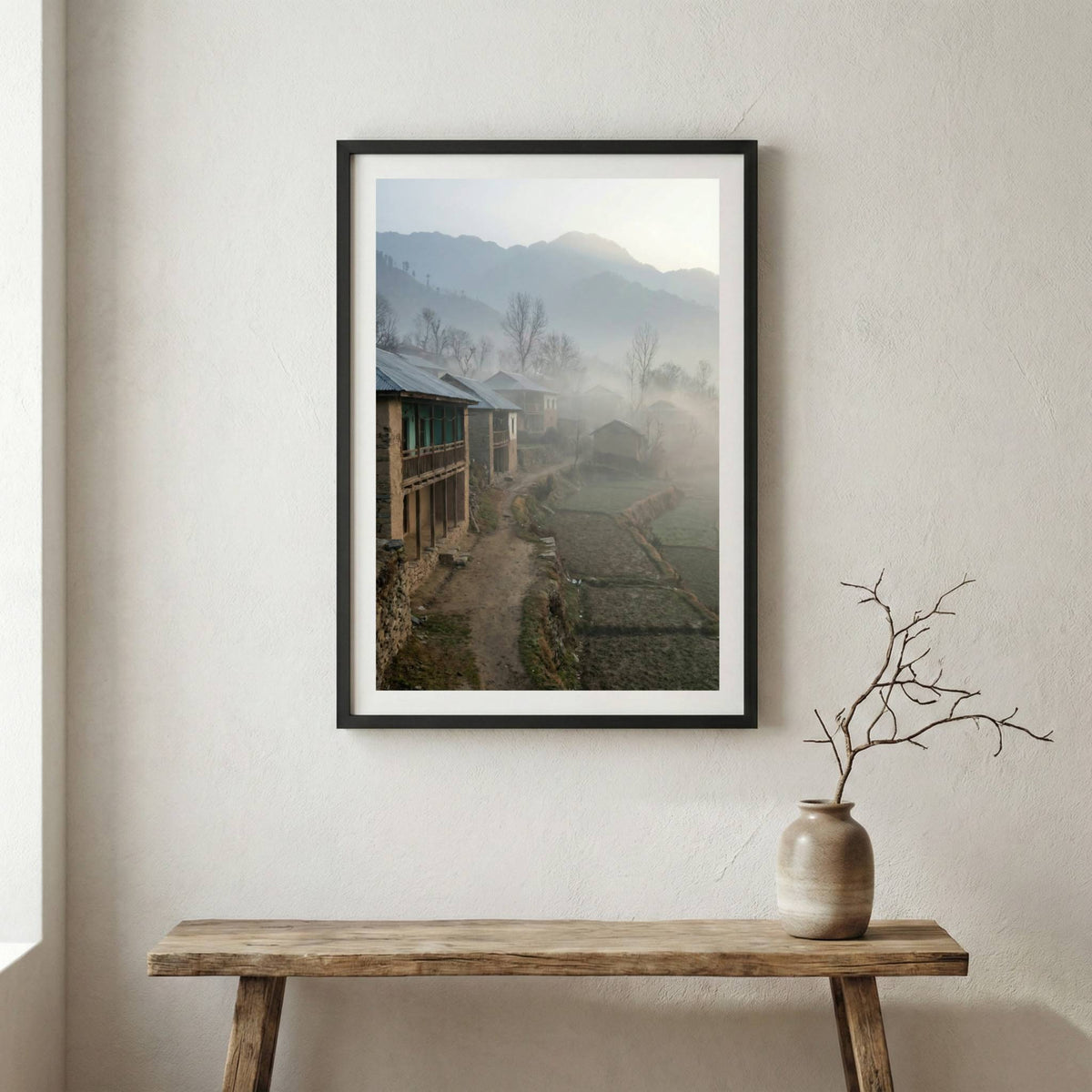 Traditional stone and wood village houses on a misty, terraced mountainside — wooden frame canvas wall art print, 12×18 in