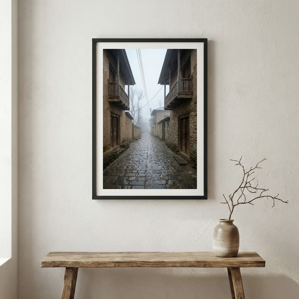 Traditional stone and wood village houses on a misty, terraced mountainside — wooden frame canvas wall art print, 12×18 in