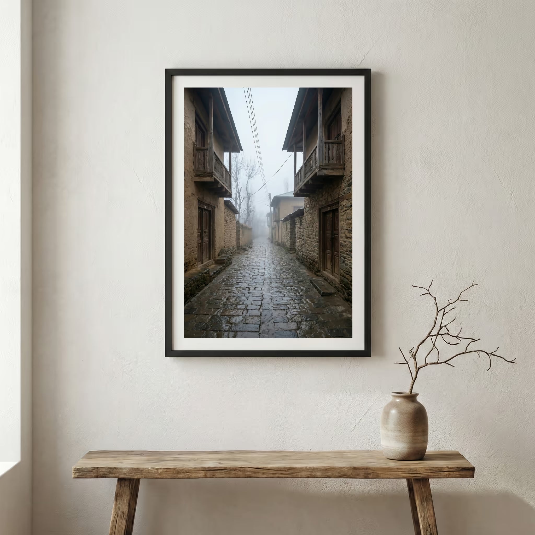 Traditional stone and wood village houses on a misty, terraced mountainside — wooden frame canvas wall art print, 12×18 in