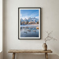 Empty mountain road stretching toward distant peaks under a dramatic, cloud-covered sky — wooden frame canvas wall art print, 12×18 in