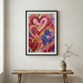 Pink Red Heart Wall Art canvas wall art in a framed room setting