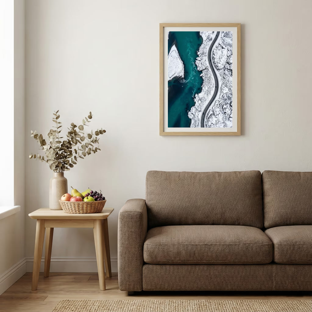 Rustic wooden door in a stone archway framing a view of snow-capped mountain peaks — wooden-frame wall art print, 20×30 in