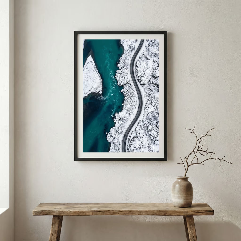 Rustic wooden door in a stone archway framing a view of snow-capped mountain peaks — wooden frame canvas wall art print, 12×18 in