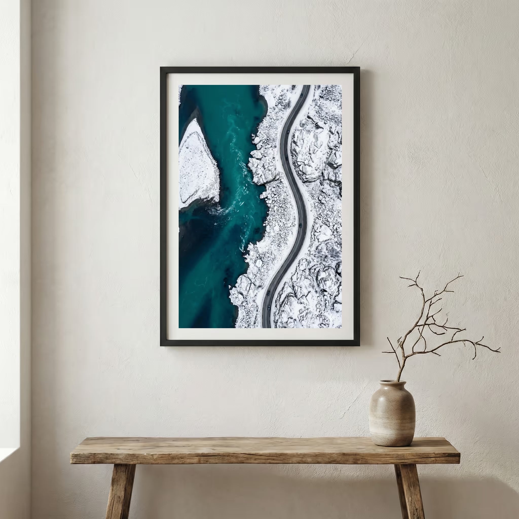 Rustic wooden door in a stone archway framing a view of snow-capped mountain peaks — wooden frame canvas wall art print, 12×18 in