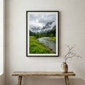 Shepherd guiding a flock of sheep past a stone doorway above a terraced river valley — wooden frame canvas wall art print, 12×18 in