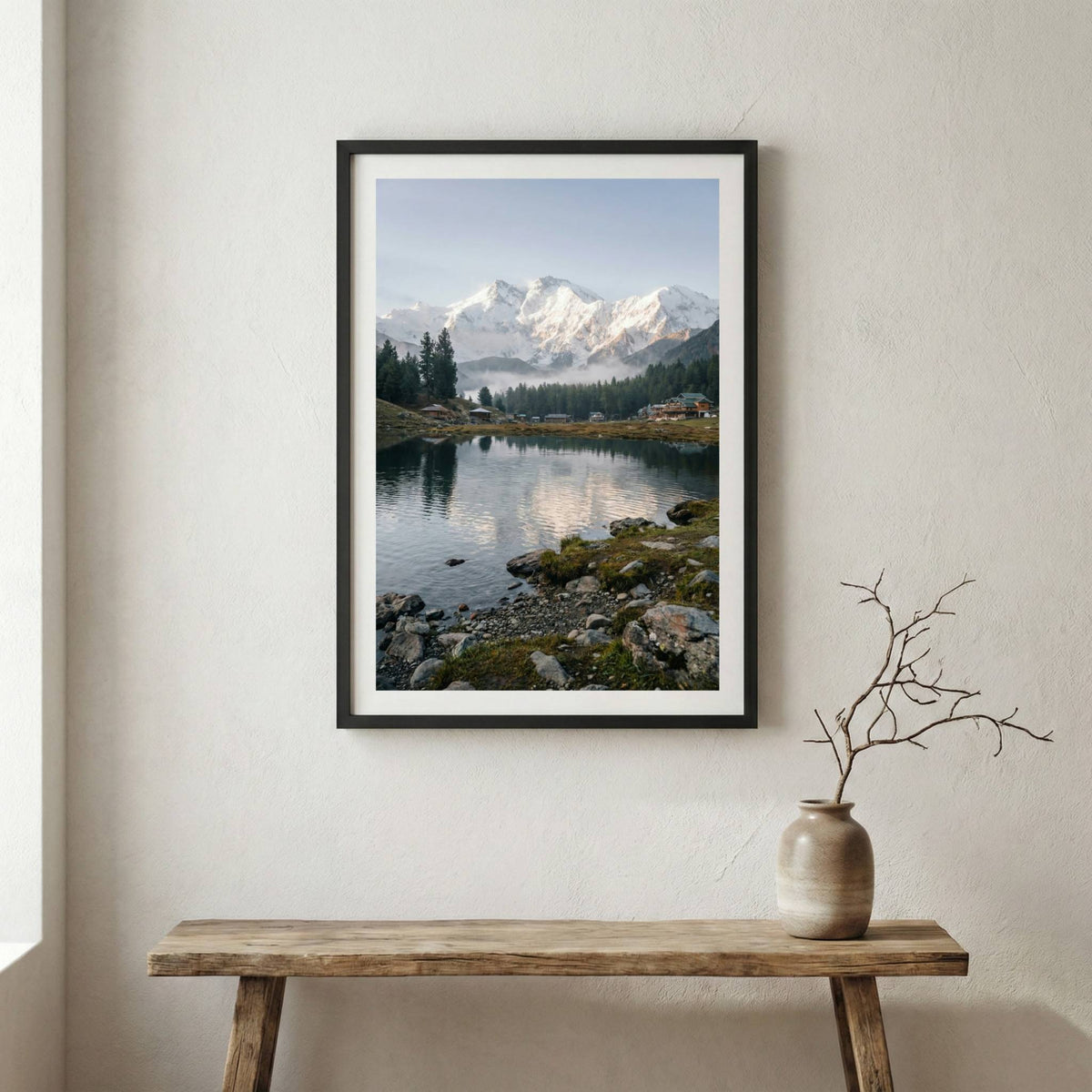 Snow-capped mountain reflected in a still lake lined with pine trees — wooden frame canvas wall art print, 12×18 in