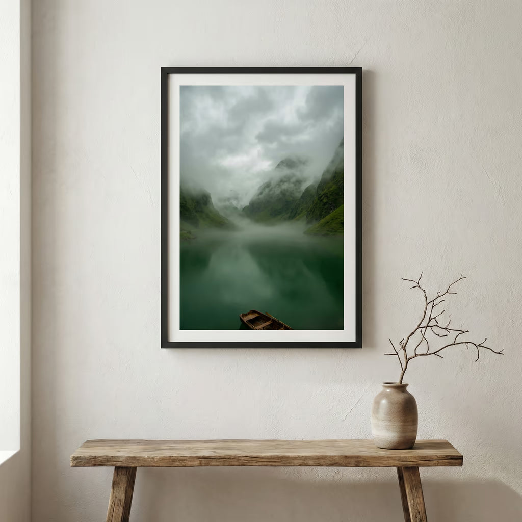 Snow-covered wooden cabin set against jagged, snow-capped mountains — wooden frame canvas wall art print, 12×18 in