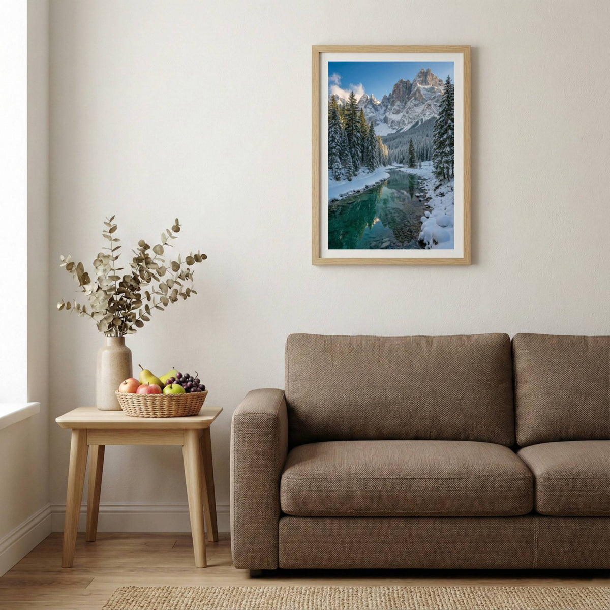 Snow-covered pine trees along a turquoise river beneath jagged snowy peaks — wooden-frame wall art print, 20×30 in