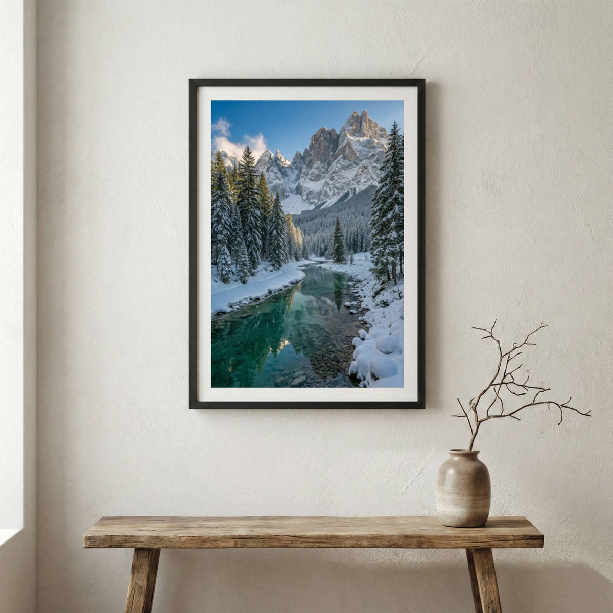Snow-covered pine trees along a turquoise river beneath jagged snowy peaks — wooden frame canvas wall art print, 12×18 in
