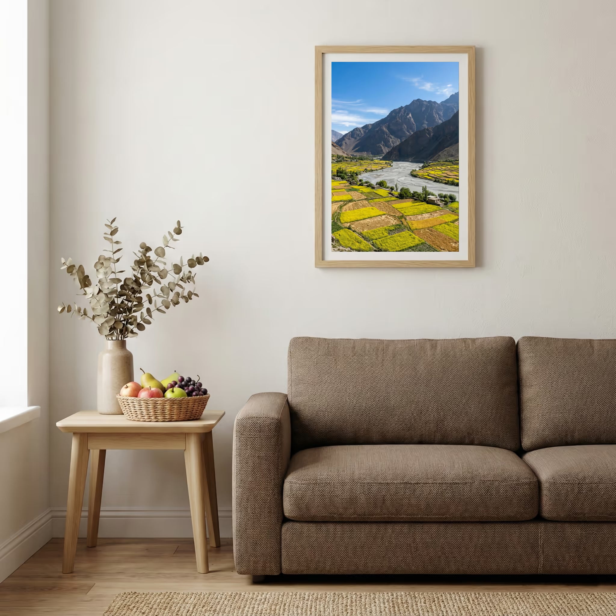 Snow-covered pine trees along a turquoise river beneath jagged snowy peaks — wooden-frame wall art print, 20×30 in