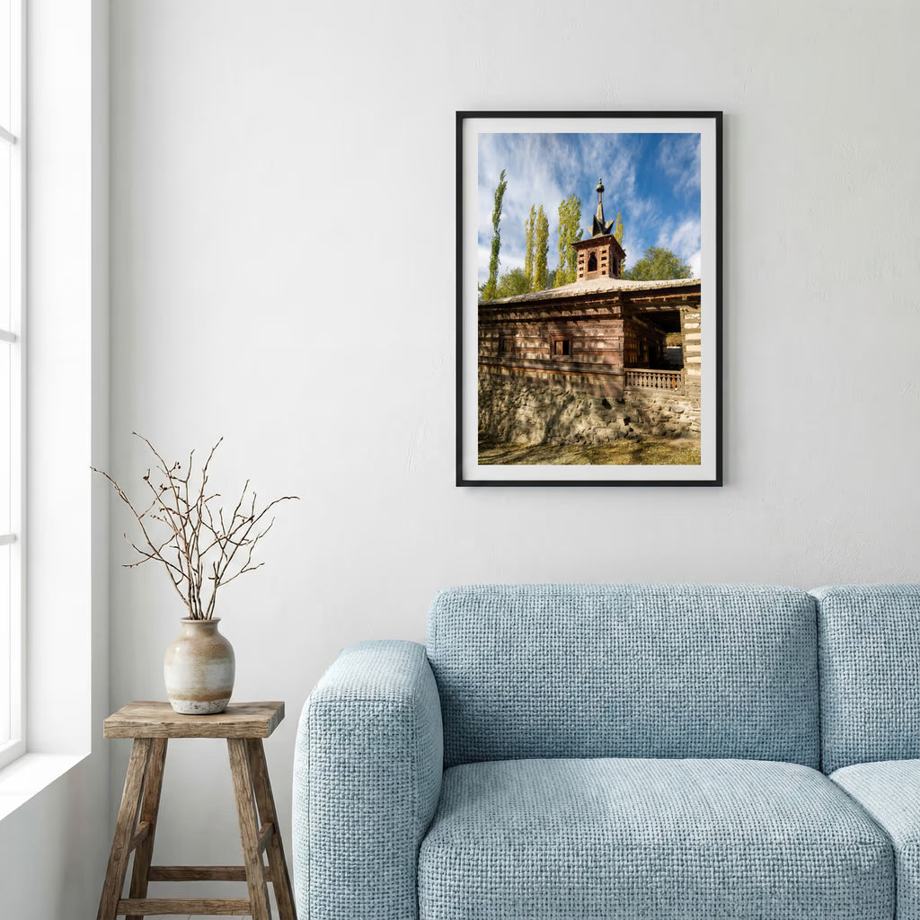 Snow-capped mountain peaks glowing at sunset above a golden poplar-lined road — framed canvas wall art in a wooden frame, 16×24 in