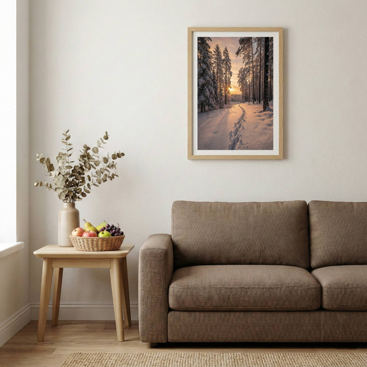 Footprints trailing down a snowy forest path lit by low, golden sun rays — wooden-frame wall art print, 20×30 in