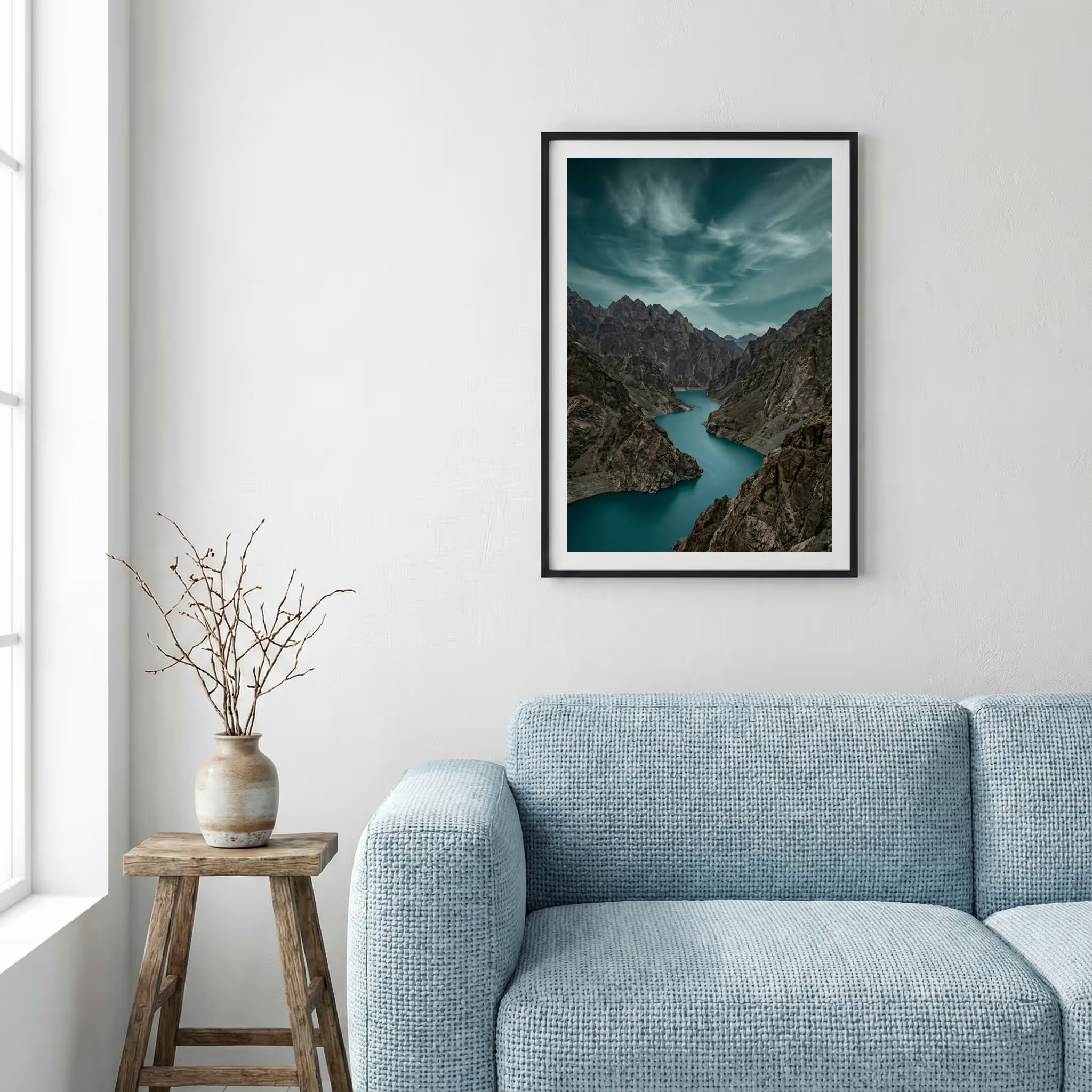 Footprints trailing down a snowy forest path lit by low, golden sun rays — framed canvas wall art in a wooden frame, 16×24 in