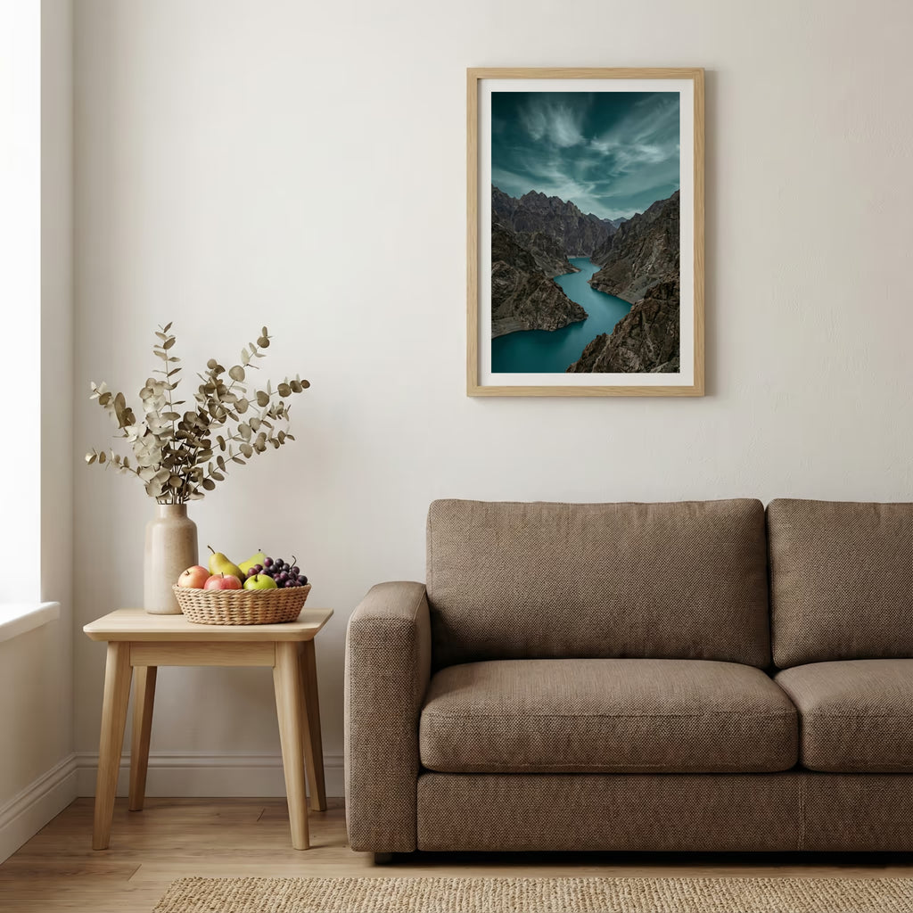 Footprints trailing down a snowy forest path lit by low, golden sun rays — wooden-frame wall art print, 20×30 in