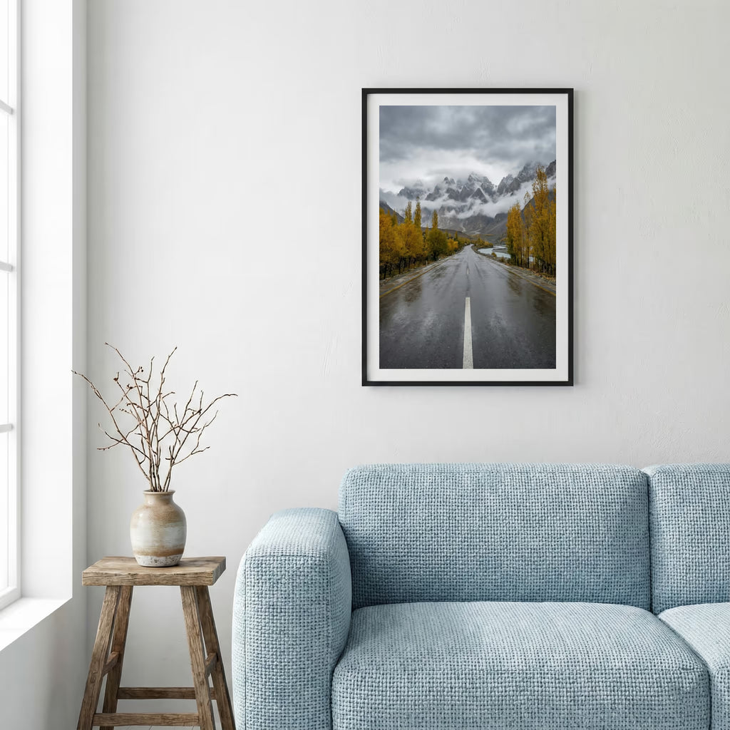 Swans gliding across a frozen lake beneath snow-capped mountains — framed canvas wall art in a wooden frame, 16×24 in