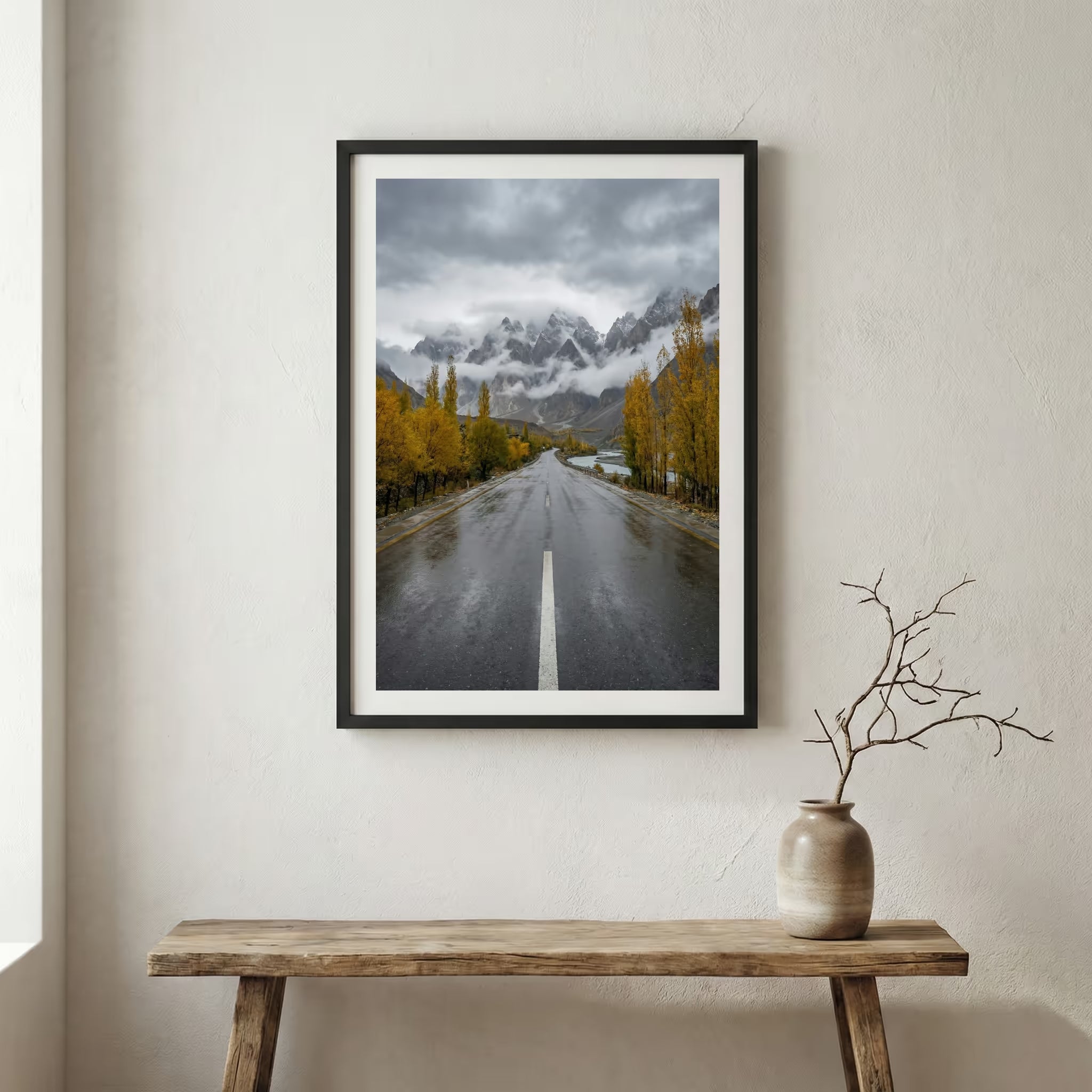 Swans gliding across a frozen lake beneath snow-capped mountains — wooden frame canvas wall art print, 12×18 in