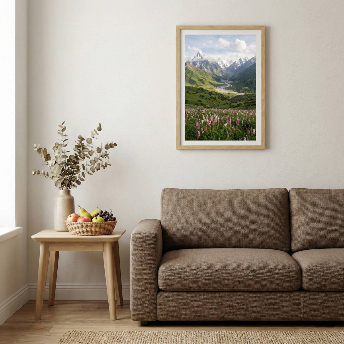 Green river valley with purple wildflowers in the foreground and snow-capped peaks beyond — wooden-frame wall art print, 20×30 in