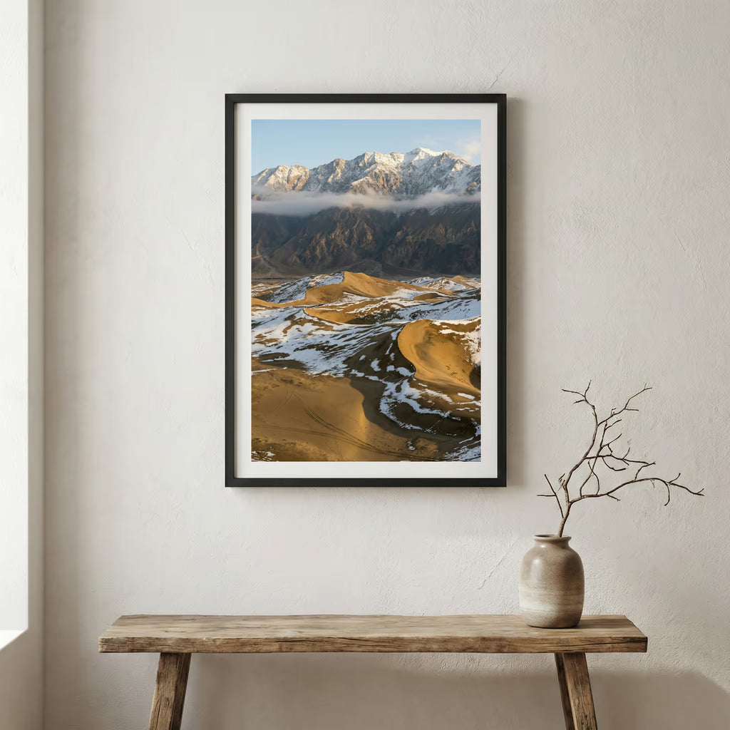 Green river valley with purple wildflowers in the foreground and snow-capped peaks beyond — wooden frame canvas wall art print, 12×18 in