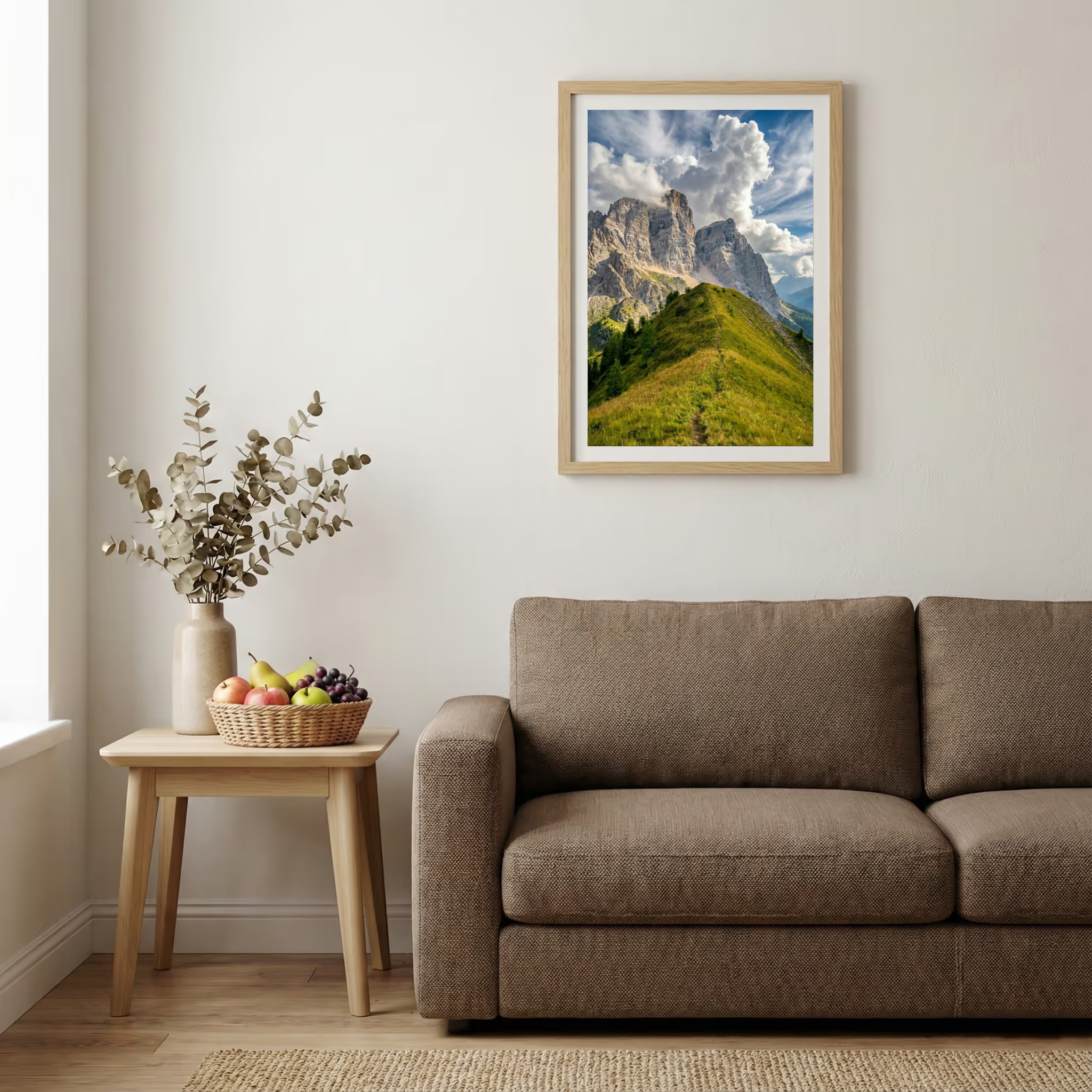 Jagged rocky peak rising above a green grassy ridge trail under a blue sky — wooden-frame wall art print, 20×30 in