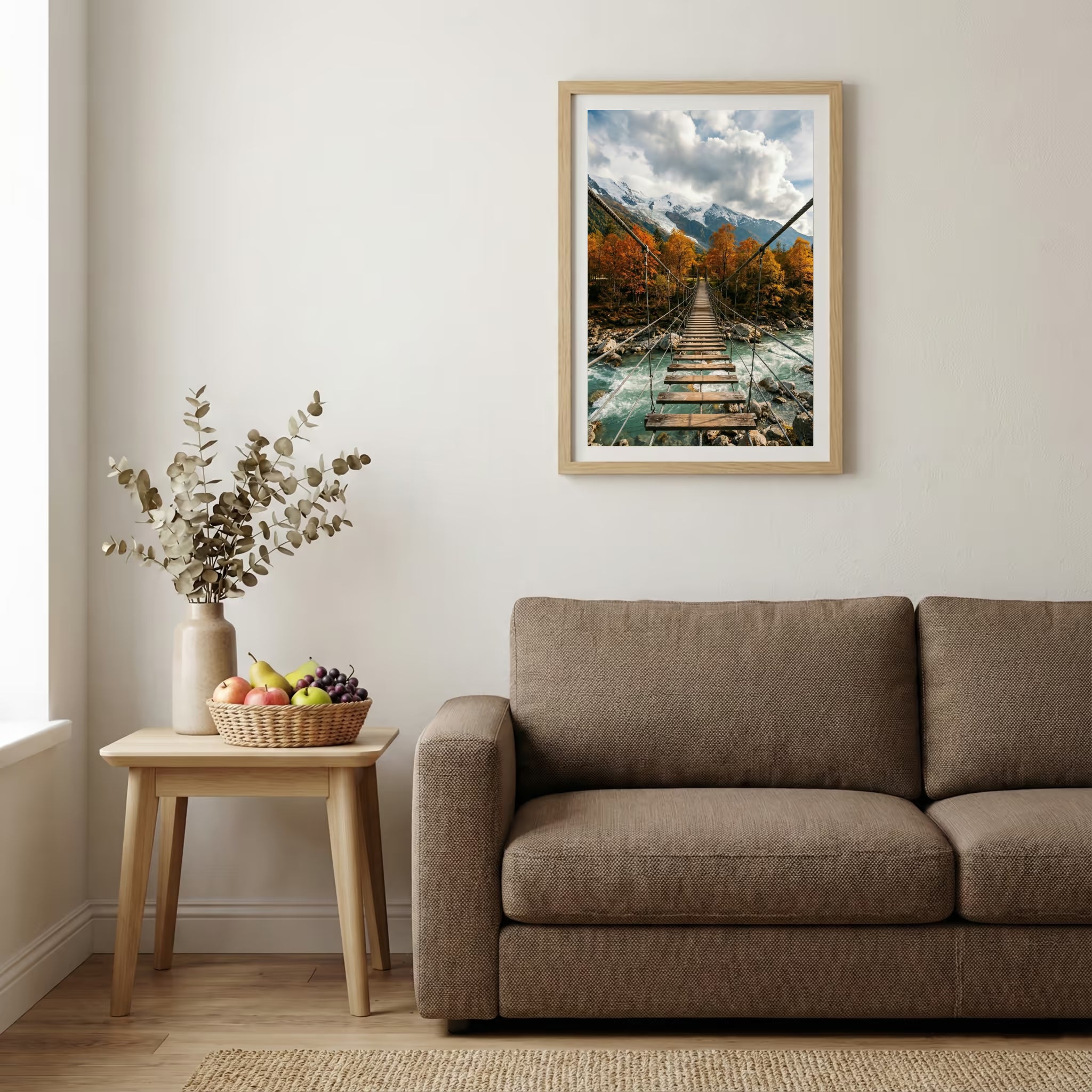 Wooden suspension bridge crossing a river gorge lined with autumn foliage — wooden-frame wall art print, 20×30 in